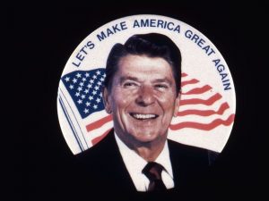 A picture of campaign slogan Let's make America great again- Ronald Reagan