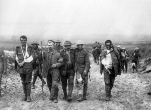 A picture depicting wounded British soldiers walking back from the front lines.