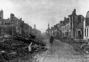 A picture depicting a German soldier walking through the ruined streets of Peronne, November 1916- the Battle of Somme