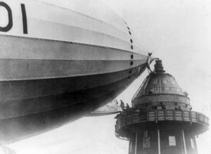 A picture of British members of Parliament (MPs) entering an airship