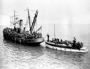 A picture of troops crowded on ships