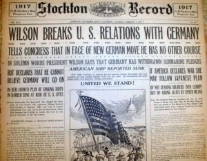 A picture of the newspaper headline stating that U.S broke ties with Germany