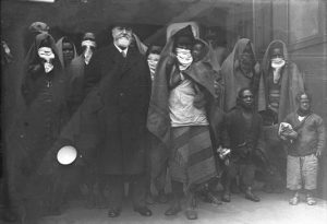 A picture of a German zoologist and the members of an African tribe