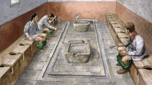 A picture of a communal toilet-What was life like in Ancient Rome?